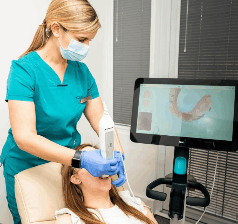 Treatment Coordinator taking a scan